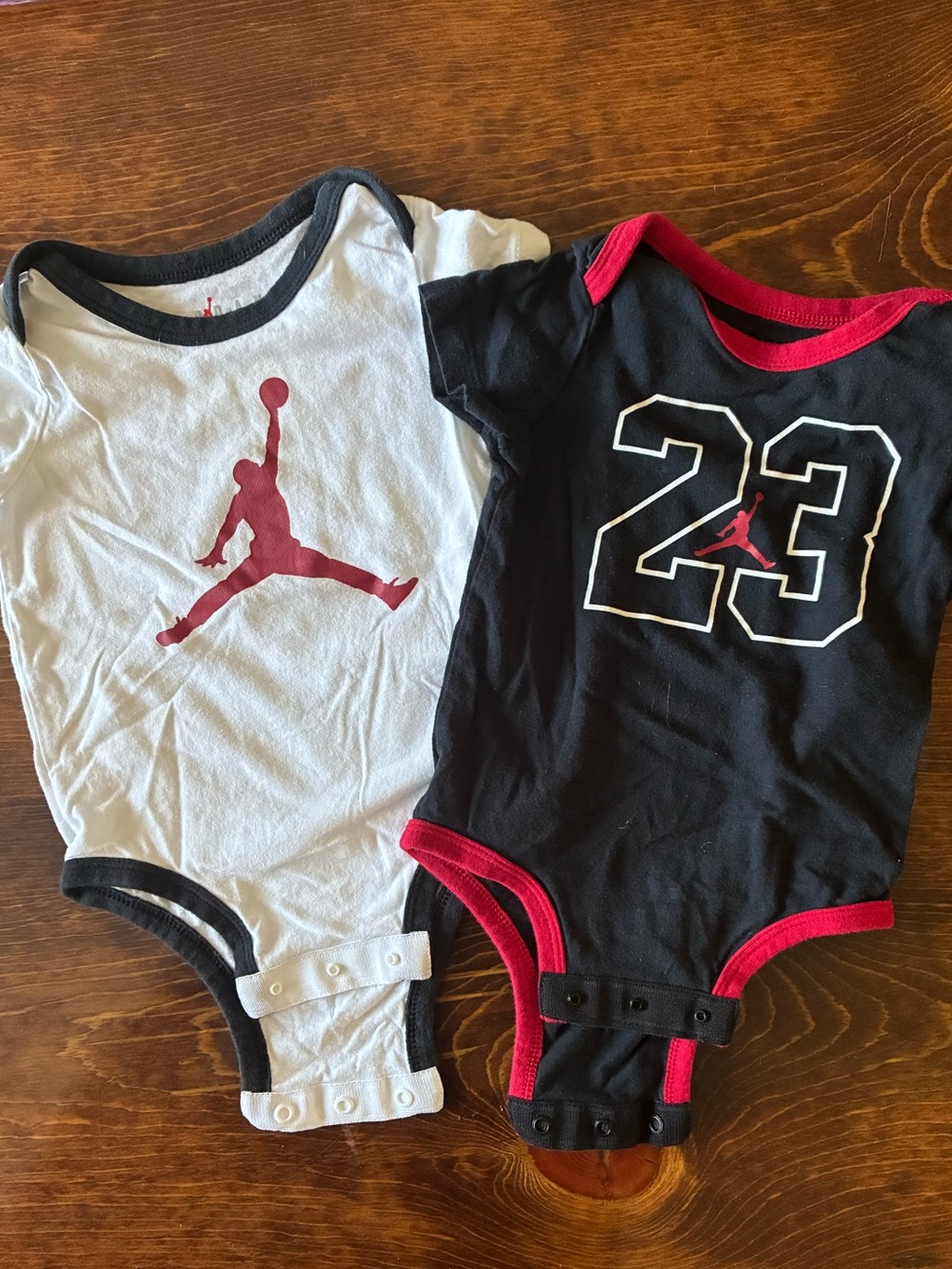 2 Baby Jordan Onesies  6/9 Month